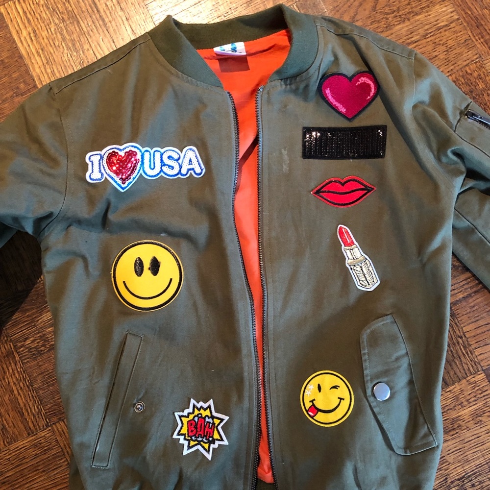 Bomber jacket w patches.  Lightweight